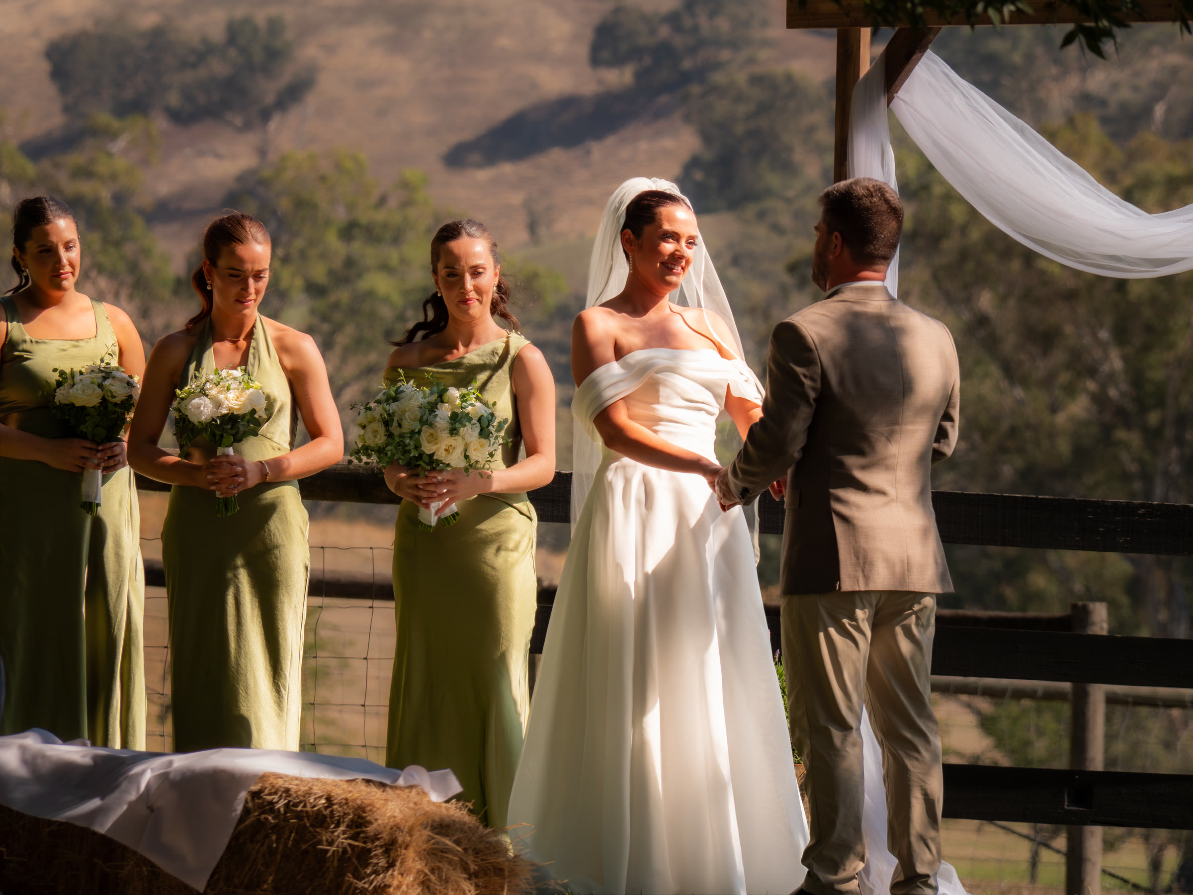 Countryside wedding ceremony at golden hour